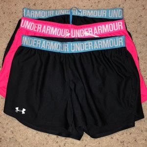 3 pairs of under armour athletic shorts.